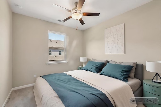 carpeted bedroom featuring ceiling fan