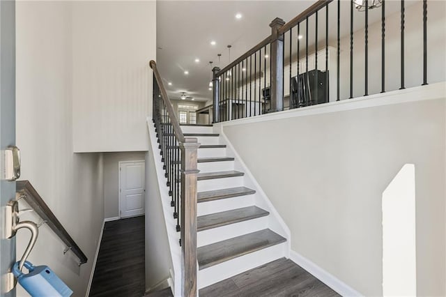 stairs with wood-type flooring