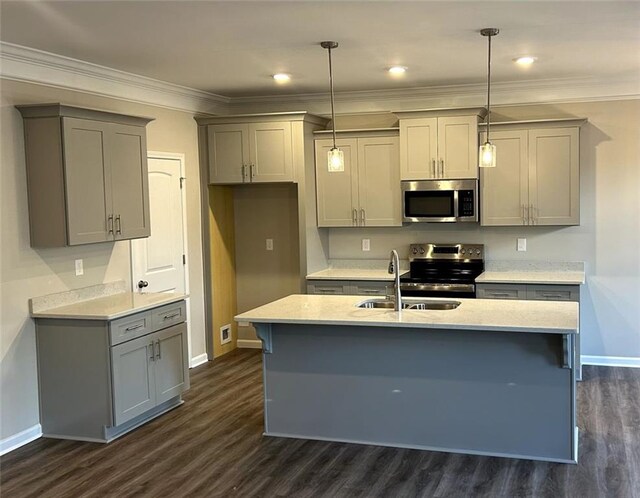 kitchen with gray cabinetry, hanging light fixtures, sink, and appliances with stainless steel finishes