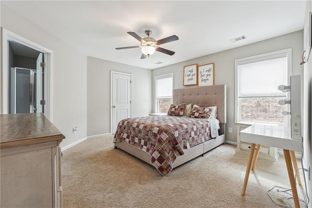 carpeted bedroom with ceiling fan