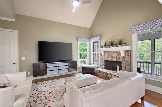 2260 Falkirk Pointe Dr, Marietta, GA 30062 - living room with wood finished floors, a ceiling fan, high vaulted ceiling, and a fireplace