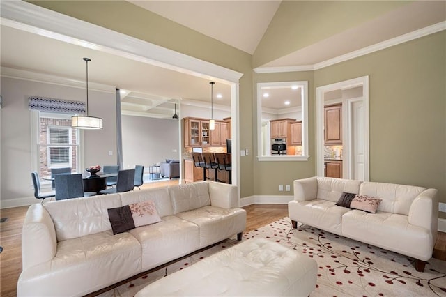 2260 Falkirk Pointe Dr, Marietta, GA 30062 - living area with light wood-style floors, ornamental molding, lofted ceiling, and recessed lighting