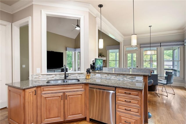 2260 Falkirk Pointe Dr, Marietta, GA 30062 - kitchen featuring dishwasher, light wood finished floors, decorative backsplash, stone counters, and ornamental molding