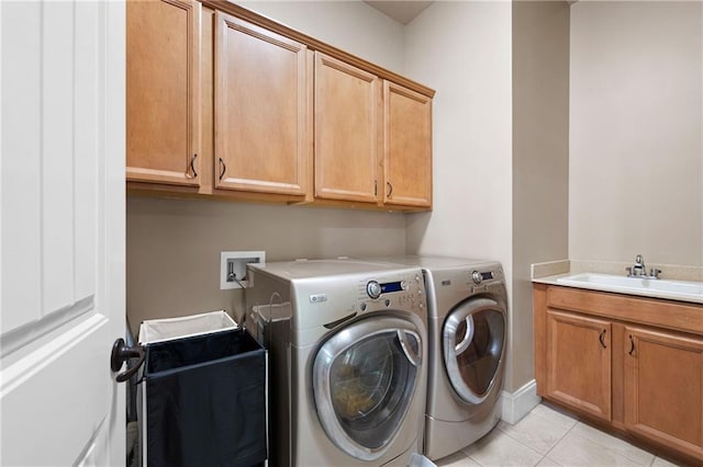 2260 Falkirk Pointe Dr, Marietta, GA 30062 - laundry area featuring separate washer and dryer, cabinet space, and light tile patterned floors