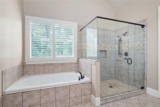 2260 Falkirk Pointe Dr, Marietta, GA 30062 - bathroom featuring a bath, a stall shower, and tile patterned floors