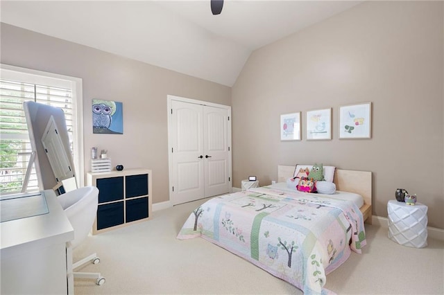 2260 Falkirk Pointe Dr, Marietta, GA 30062 - bedroom featuring carpet floors, multiple windows, a closet, vaulted ceiling, and ceiling fan