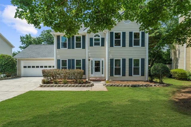 1410 Kingfield Dr, Johns Creek, GA 30005 - view of front facade featuring driveway, a garage, and a front yard