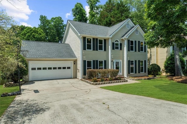 1410 Kingfield Dr, Johns Creek, GA 30005 - colonial-style house with an attached garage, concrete driveway, a front yard, and roof with shingles