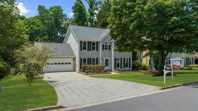 1410 Kingfield Dr, Johns Creek, GA 30005 - colonial inspired home featuring an attached garage, driveway, a front lawn, and a shingled roof