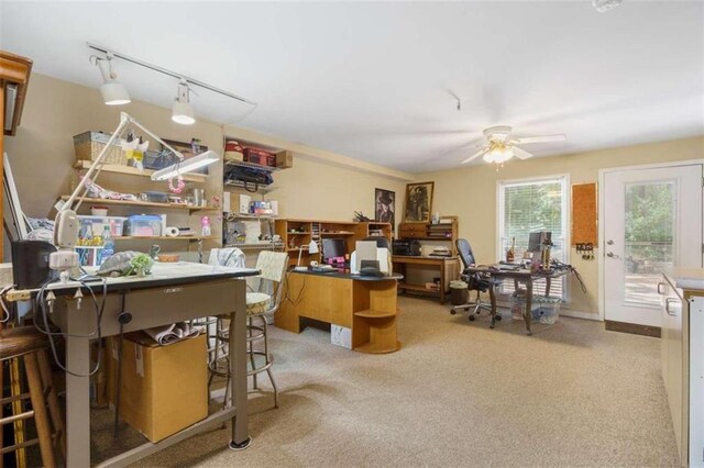 home office with rail lighting, carpet floors, and ceiling fan