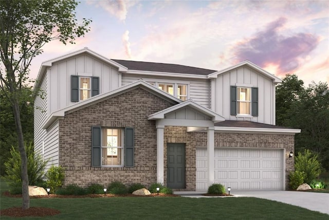 view of front of home featuring board and batten siding, brick siding, driveway, and a garage