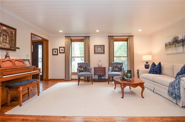 4366 Cedar Wood Dr SW, Lilburn, GA 30047 - living room featuring wood finished floors, crown molding, and recessed lighting