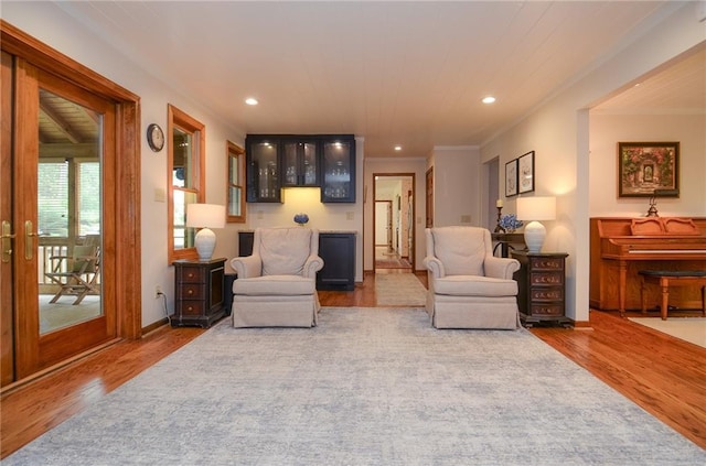 4366 Cedar Wood Dr SW, Lilburn, GA 30047 - living room featuring wood finished floors, ornamental molding, recessed lighting, and baseboards