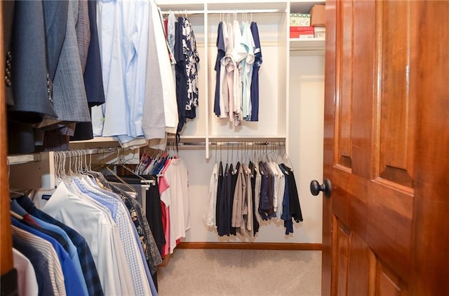 4366 Cedar Wood Dr SW, Lilburn, GA 30047 - walk in closet featuring carpet flooring