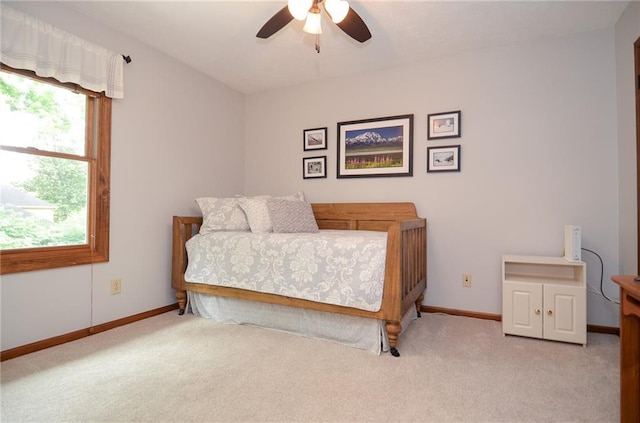4366 Cedar Wood Dr SW, Lilburn, GA 30047 - bedroom featuring carpet floors, baseboards, and ceiling fan