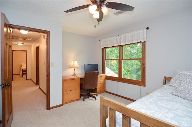 4366 Cedar Wood Dr SW, Lilburn, GA 30047 - bedroom featuring light colored carpet, an office area, baseboards, and a ceiling fan