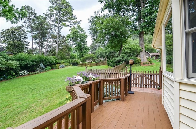 4366 Cedar Wood Dr SW, Lilburn, GA 30047 - deck featuring a lawn and view of wooded area
