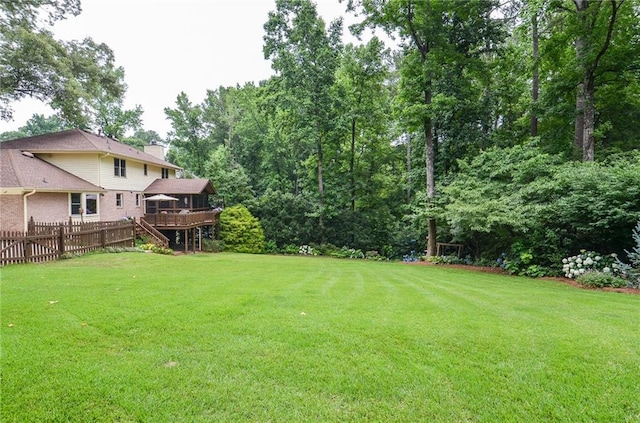4366 Cedar Wood Dr SW, Lilburn, GA 30047 - view of yard with a wooden deck and stairs