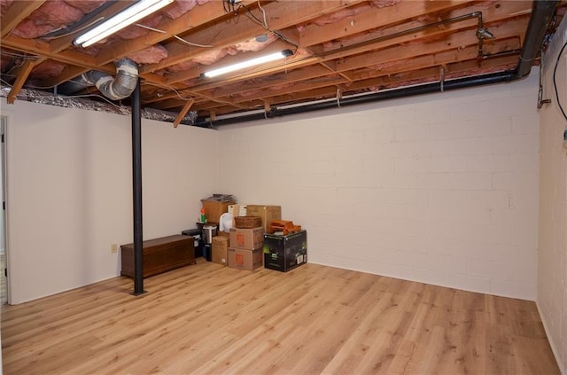 4366 Cedar Wood Dr SW, Lilburn, GA 30047 - unfinished basement with wood finished floors