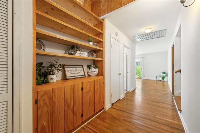 hallway featuring light hardwood / wood-style floors