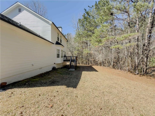 view of yard featuring a deck