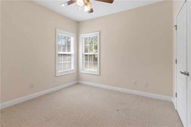 240 Huiet Dr, Mcdonough, GA 30252 - empty room with ceiling fan, light colored carpet, and baseboards