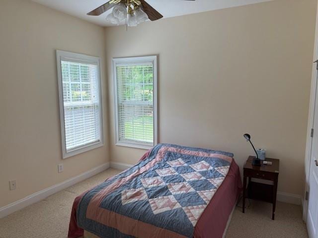 240 Huiet Dr, Mcdonough, GA 30252 - bedroom with light colored carpet, baseboards, and ceiling fan