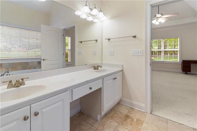 240 Huiet Dr, Mcdonough, GA 30252 - bathroom featuring baseboards, double vanity, and ceiling fan