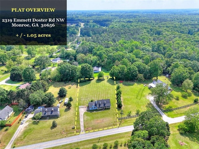 bird's eye view featuring a view of trees