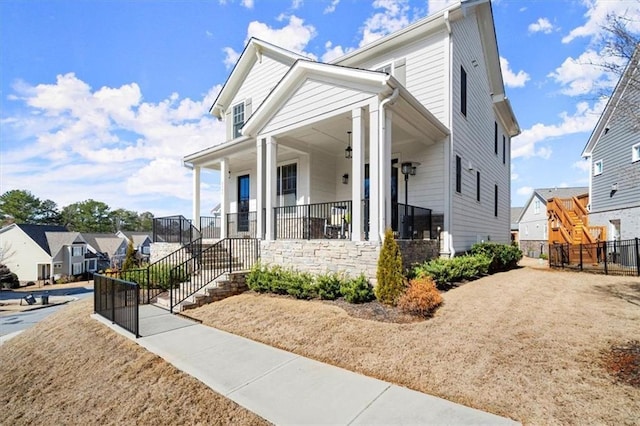 2005 Haley Walk, Woodstock, GA 30188 - view of front of property featuring a porch, a residential view, and stairway