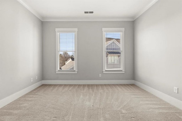 2005 Haley Walk, Woodstock, GA 30188 - empty room featuring crown molding, healthy amount of natural light, carpet floors, and baseboards