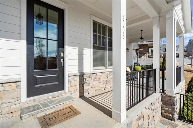 2005 Haley Walk, Woodstock, GA 30188 - property entrance with a porch and stone siding