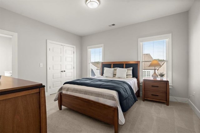 2005 Haley Walk, Woodstock, GA 30188 - bedroom featuring light colored carpet, a closet, and baseboards