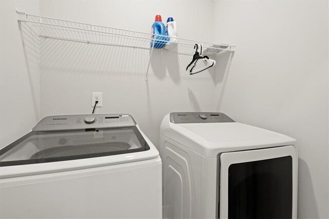 2005 Haley Walk, Woodstock, GA 30188 - laundry room with washer and clothes dryer