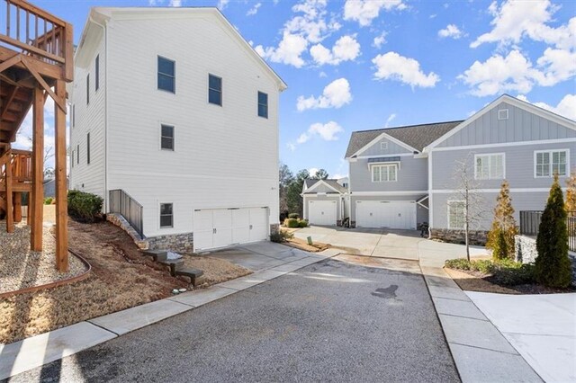 2005 Haley Walk, Woodstock, GA 30188 - view of asphalt driveway