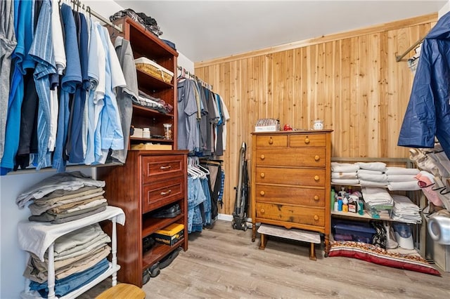 5102 Yellow Stone Dr, Flowery Branch, GA 30542 - walk in closet with wood finished floors