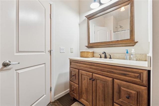 5102 Yellow Stone Dr, Flowery Branch, GA 30542 - full bath featuring vanity, baseboards, and a shower