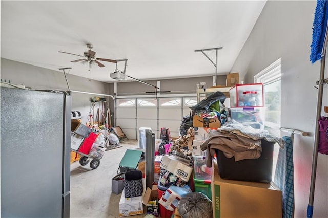 5102 Yellow Stone Dr, Flowery Branch, GA 30542 - garage with freestanding refrigerator, a garage door opener, and a ceiling fan