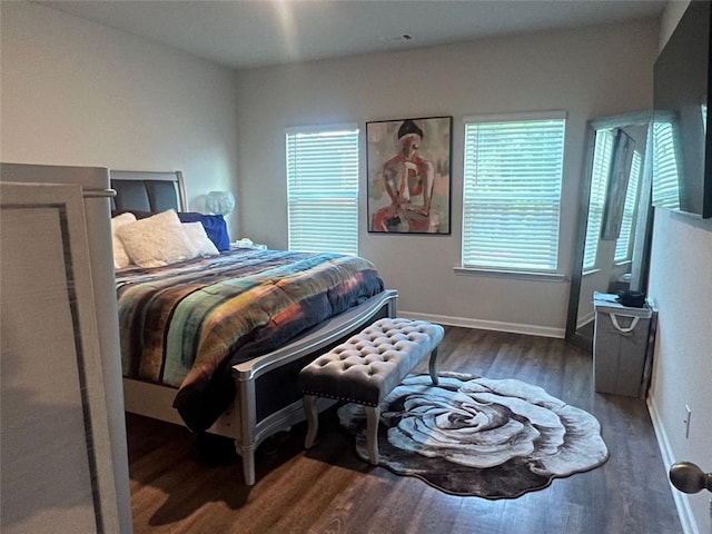 bedroom featuring dark wood-type flooring