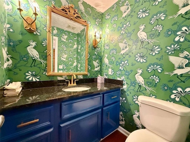 8710 Mount Rushmore Dr, Johns Creek, GA 30022 - bathroom with wallpapered walls, toilet, and vanity