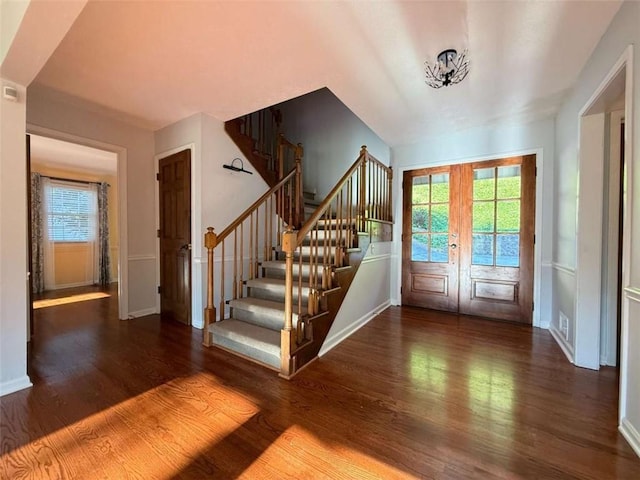 8710 Mount Rushmore Dr, Johns Creek, GA 30022 - entryway featuring wood finished floors, french doors, stairs, and plenty of natural light