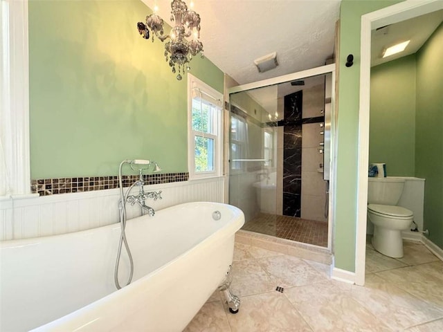 8710 Mount Rushmore Dr, Johns Creek, GA 30022 - full bath with toilet, a shower stall, a freestanding bath, and tile patterned flooring