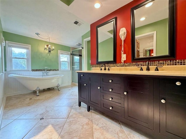 8710 Mount Rushmore Dr, Johns Creek, GA 30022 - full bathroom with a stall shower, double vanity, a soaking tub, tile patterned flooring, and recessed lighting