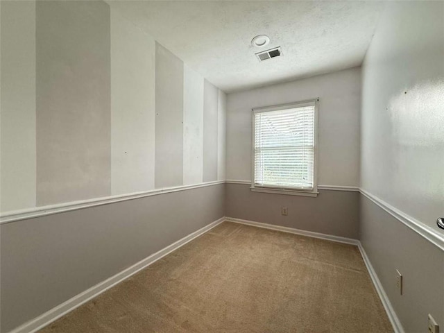 8710 Mount Rushmore Dr, Johns Creek, GA 30022 - carpeted empty room with a textured ceiling and baseboards