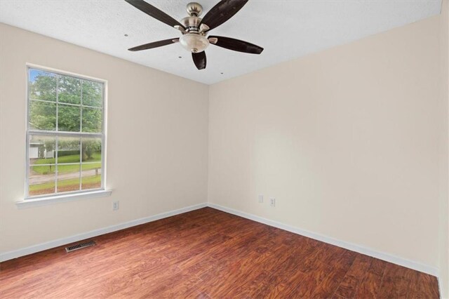 35 Lady Morgan Ln, Dallas, GA 30157 - spare room featuring wood finished floors, baseboards, and ceiling fan