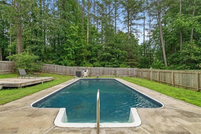 35 Lady Morgan Ln, Dallas, GA 30157 - view of swimming pool featuring a deck, a fenced backyard, view of wooded area, and a patio