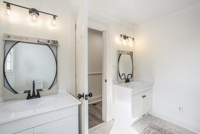 bathroom featuring vanity and ornamental molding