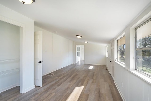 spare room featuring light hardwood / wood-style flooring