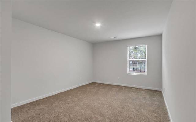 view of carpeted spare room