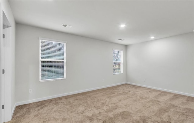 view of carpeted spare room